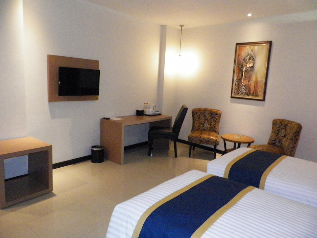 D'Best Hotel Pasar Baru Бандунг Стая снимка