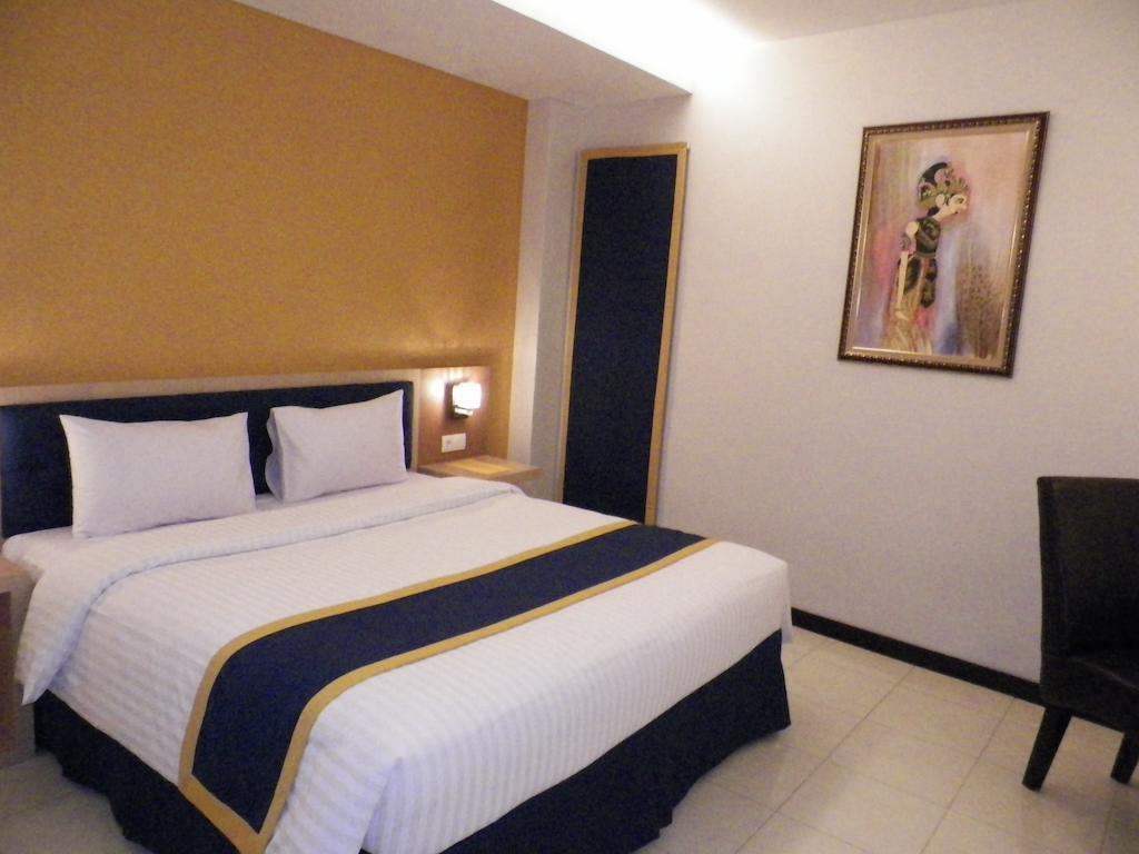 D'Best Hotel Pasar Baru Бандунг Стая снимка